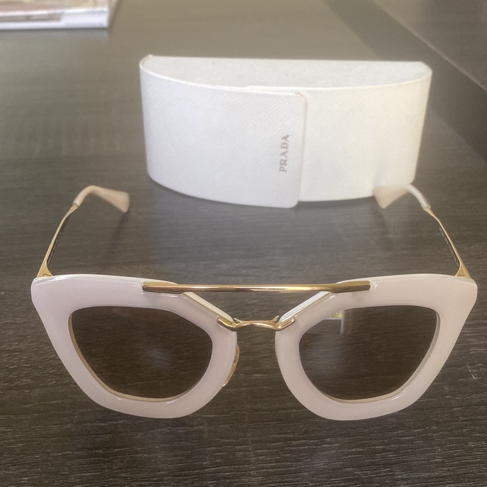 Prada light grey cinema sunglasses SPR09Q with case. Like new.
